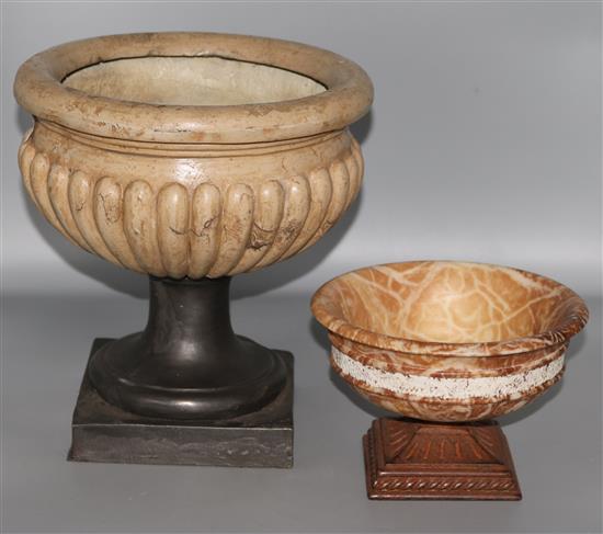 Two campana shaped urns